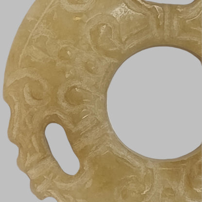 Ancient Style Carved Jade Bi Disc Pendant – Tribal Motif, Natural Stone Amulet Left