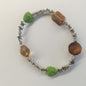 Starry Harmony Bracelet with Green Hearts &amp; Amber Accents